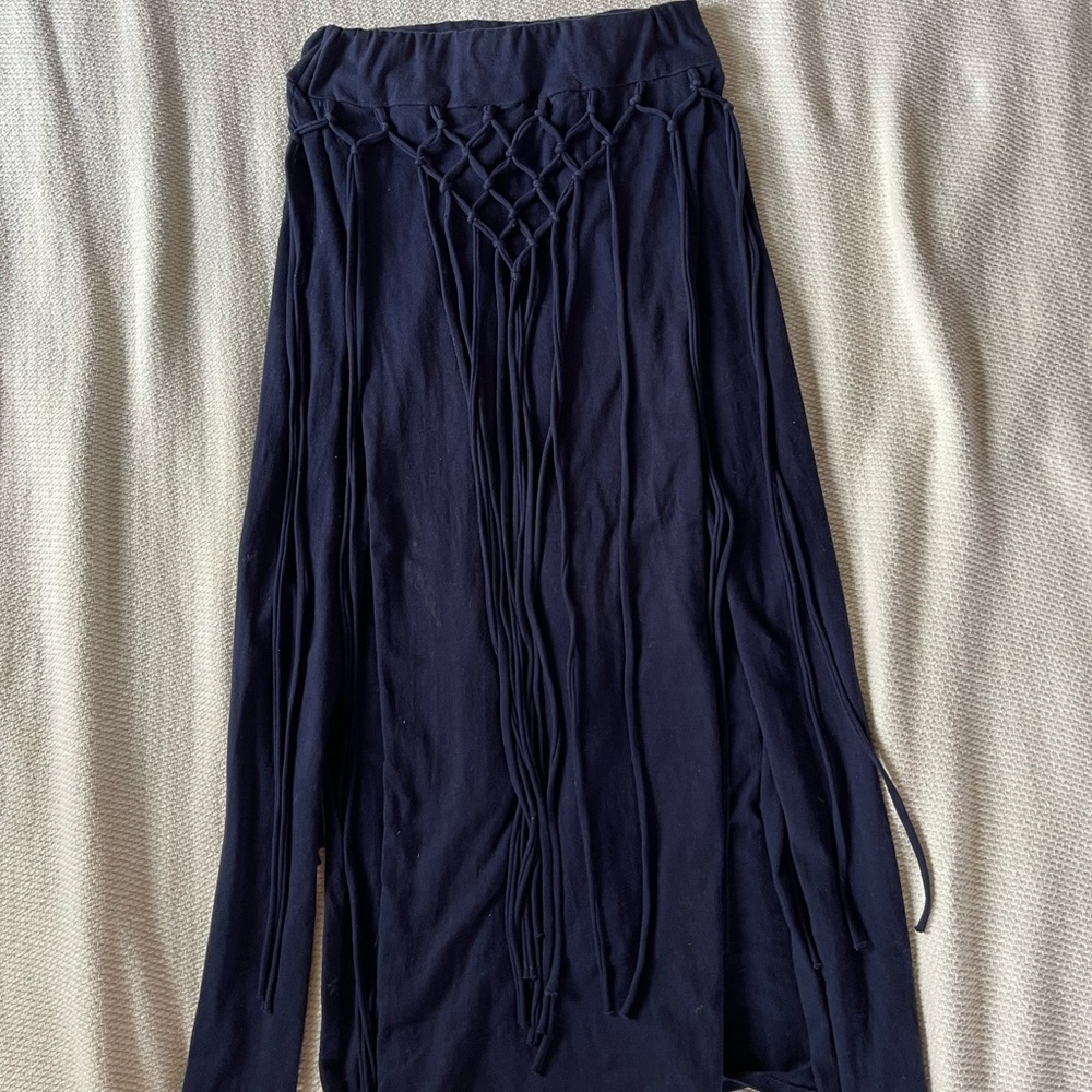 Fringe, high slits skirt